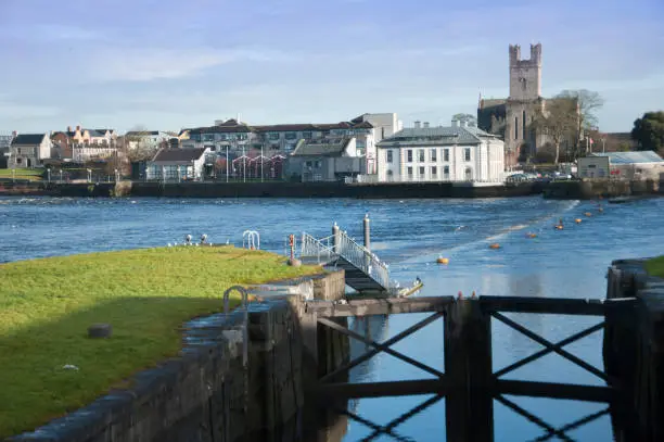 A lock on the Shannon river estuary at the city of Limerick, Republic of Ireland
