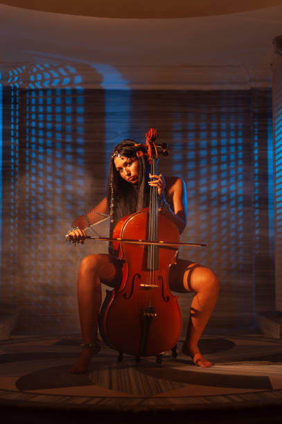 Cellist musician woman performing in Turkish bath