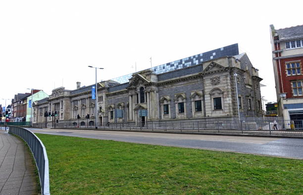 Plymouth England February 2020. Plymouth Museum. Opened 1910. Refurbished 2020. Edwardian Baroque style. At rear is The Box reflective facade opened 2020 as part of museum and document archive space.