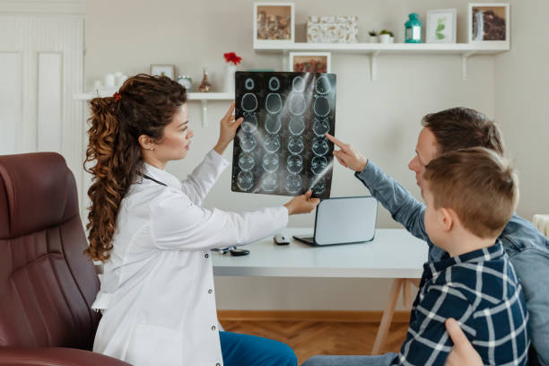 istock Discussing X-ray Report With Patient 1209517616