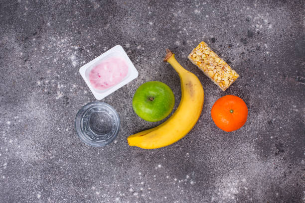 istock Apple, yogurt, banana and granola bar 1209521339