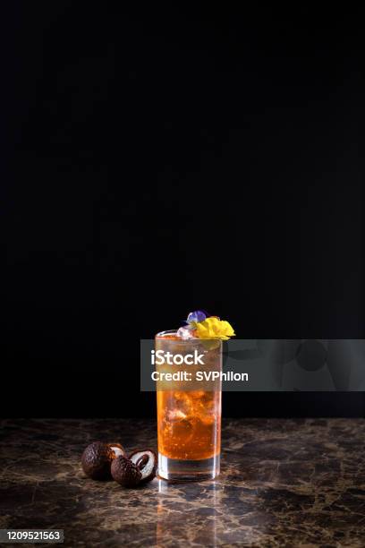 Cloudy Lemonade The Drink Is Located On A Black Background Stock Photo - Download Image Now
