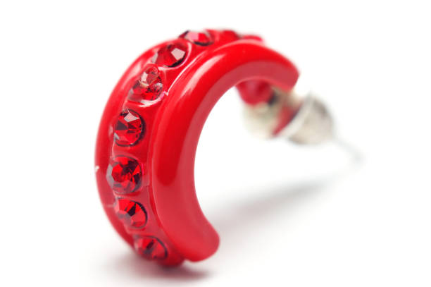 Women's red earring  isolated on white background