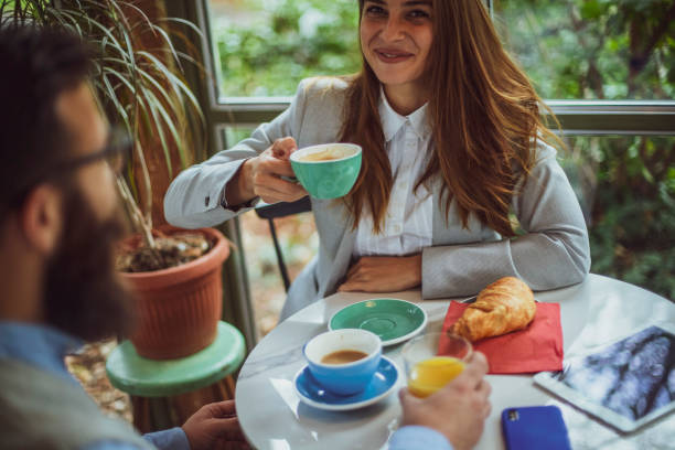istock Morning meeting over breakfast in a beautiful coffee house 1209527983