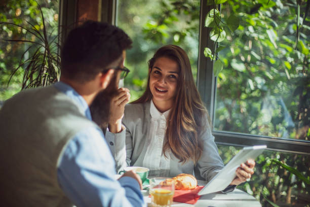 istock Morning meeting over breakfast in a beautiful coffee house 1209528009