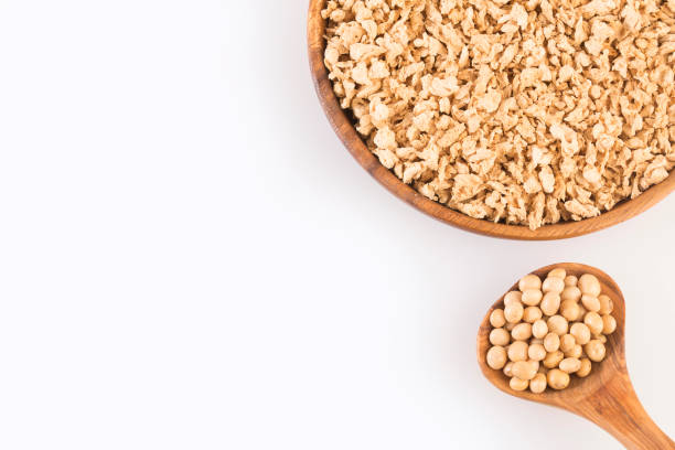 istock Crushed soybeans - Glycine max. White background 1209533207