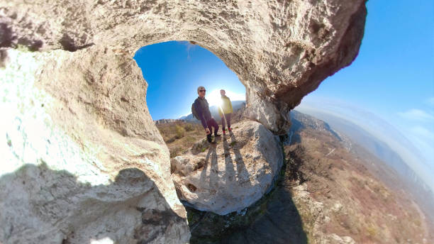 istock Two male hikers on mountain 1209545787