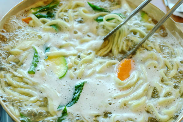 Korean hot pot with vegetables and noodles
