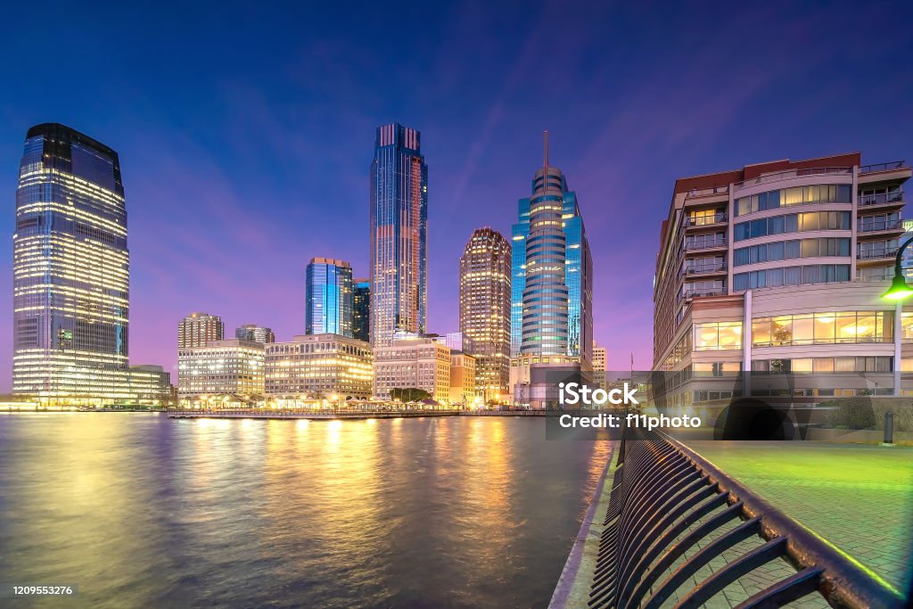 Skyline of Jersey City, New Jersey from New York Harbor Skyline of Jersey City, New Jersey from New York Harbor in USA Jersey City Stock Photo