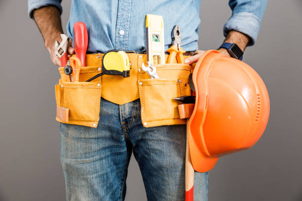 istock Builder with belt of hand tools stock photo 1209554745
