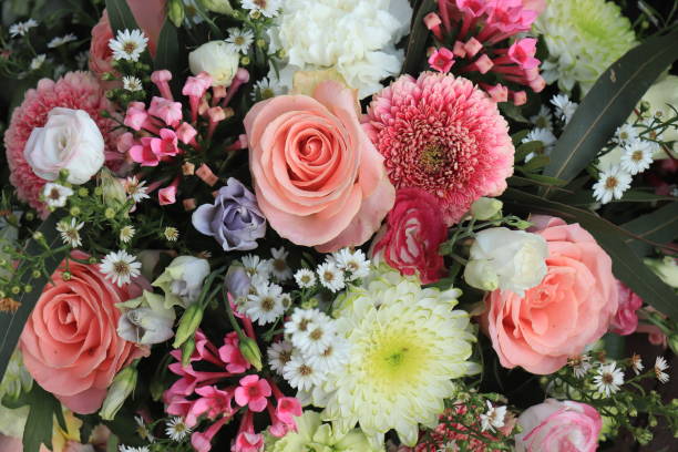 istock Yellow and pink wedding flowers 1209559309