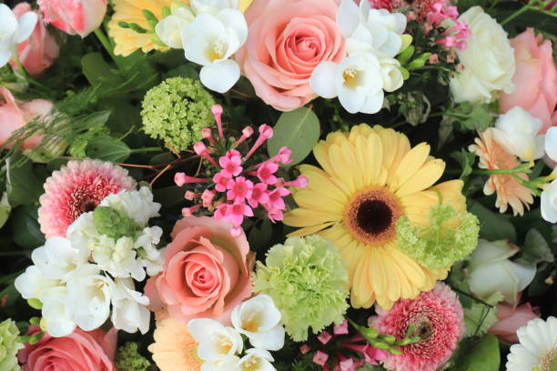 Yellow and pink wedding flowers stock photo
