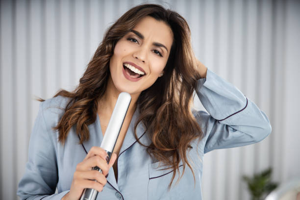 istock Pretty young woman having fun at home 1209568588