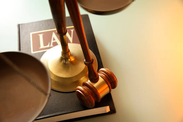 istock Gavel Resting On Law Book 1209569494