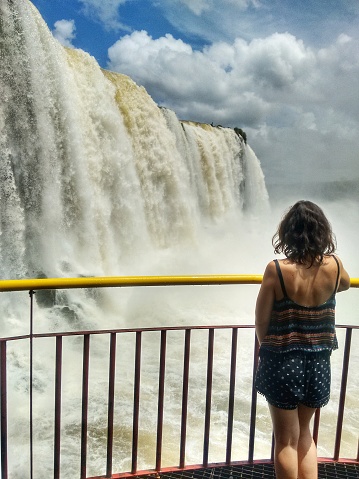 Iguazú Falls or Iguaçu Falls are waterfalls of the Iguazu River on the border of the Argentine province of Misiones and the Brazilian state of Paraná. Together, they make up the largest waterfall in the world. The falls divide the river into the upper and lower Iguazu.