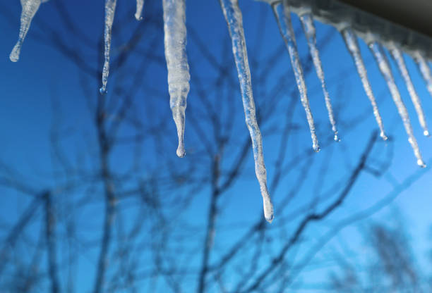 istock Icicles against the blue sky. 1209585846