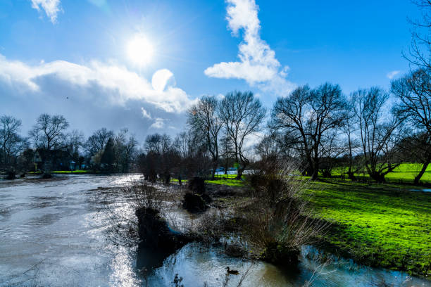 River Avon Warwickshire Midlands England UK. The river is in flood after heavy rain.