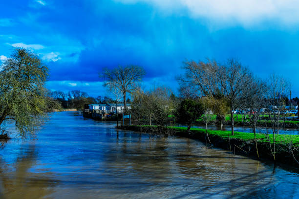 River Avon Warwickshire Midlands England UK. The river is in flood after heavy rain.