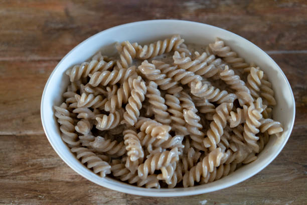 istock homemade fusilli with onion cream sauce 1209593116