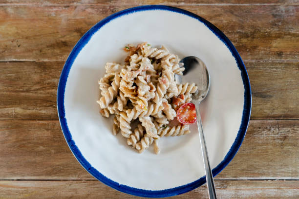 istock homemade fusilli with cream sauce 1209593127
