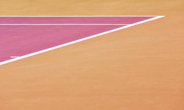 istock White lines on pink tennis court 1209593182