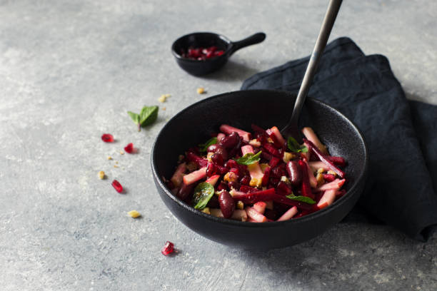 istock Beetroot, apple and red beans vegan salad 1209601334