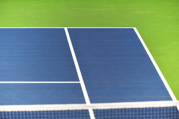 istock White lines on blue tennis court 1209602460