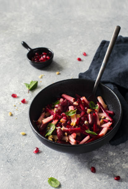 istock Beetroot, apple and red beans vegan salad 1209603463