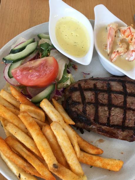 istock Steak,  chips and salad meal 1209605410
