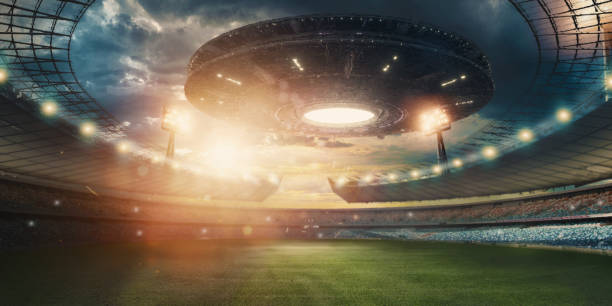 istock UFO, an alien plate hovering over the field, hovering motionless in the air. Unidentified flying object, alien invasion, extraterrestrial life, space travel, humanoid spaceship. mixed medium 1209611776