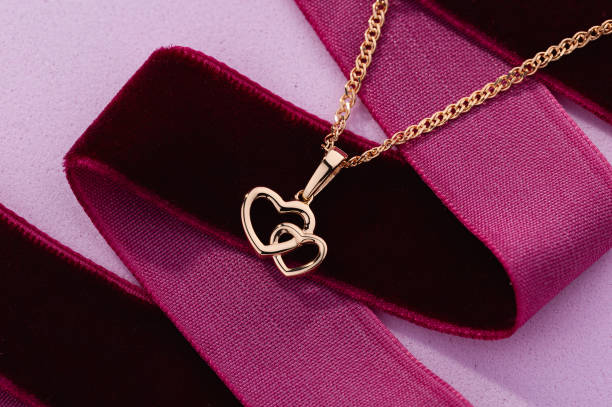 istock Hearts shape rose gold pendant necklace 1209614210