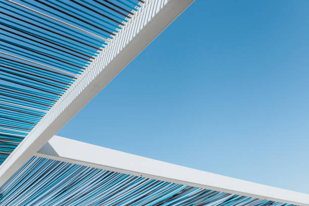 istock Low Angle View Of Shade Structure Against Clear Blue Sky 1209618881