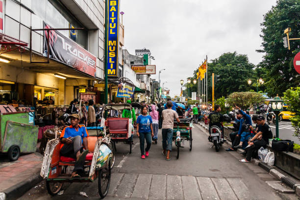 Jalan Malioboro is a major shopping street in Yogyakarta, Indonesia; the name is also used more generally for the neighborhood around the street. It lies north-south axis in the line between Yogyakarta Kraton and Mount Merapi.