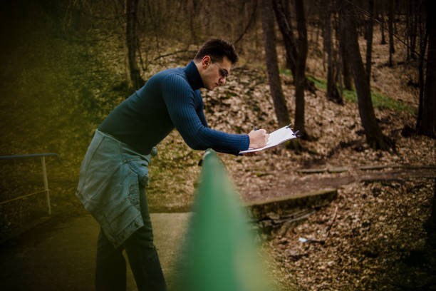istock A young artist draws in nature 1209621769