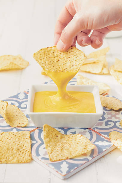 istock Vegan cheese sauce with nachos 1209622720