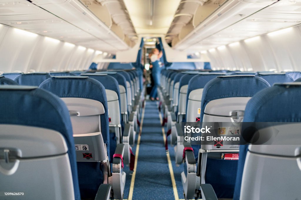 Empty Airplane Cabin Interior Empty airplane cabin interior Airplane Stock Photo