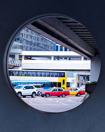 Day traffic. View through the frame of a city street with transport. Hong Kong