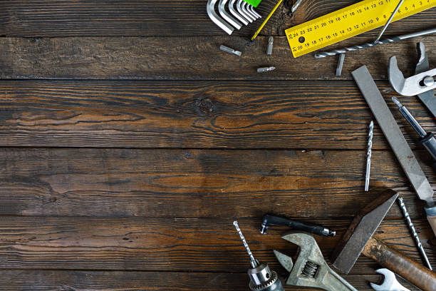 istock Set of working tools on wooden rustic background. Top view. Copy space 1209627361