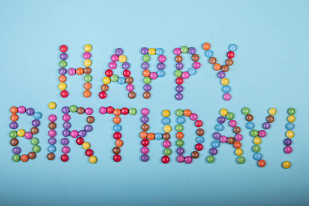 istock Happy Birthday with light blue background, smarties 1209630966