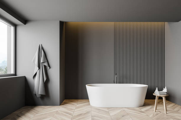 istock Gray loft bathroom interior with tub 1209632415