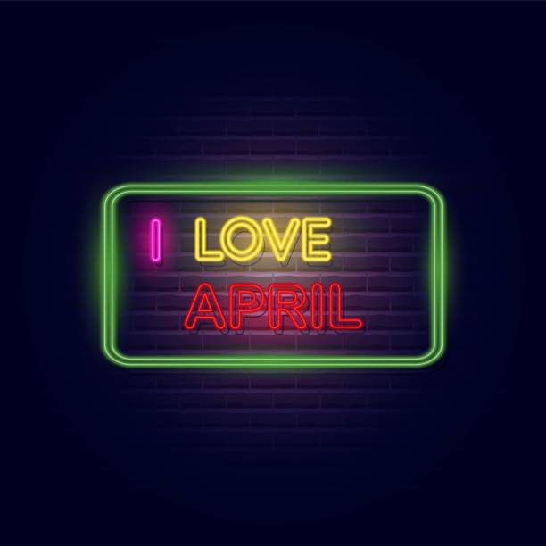 istock I love April neon light banner. Glowing neon text on brick wall. Vector Illustration 1209633468