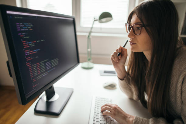 istock Young businesswoman working on computer 1209633569