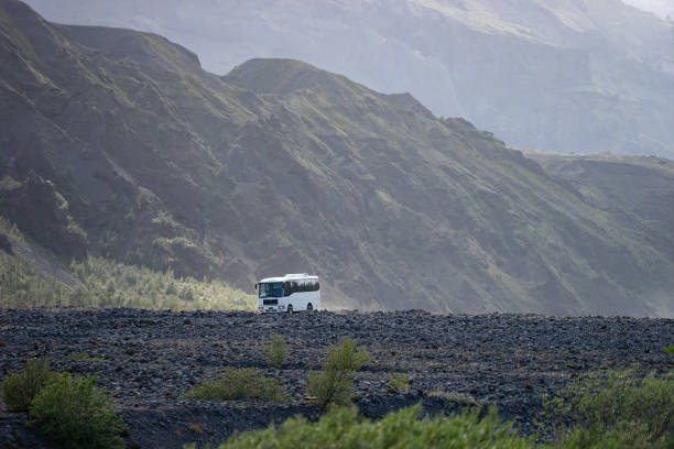 istock Iceland mountain view with 4x4 big bus. Waiting for tourists 1209638340