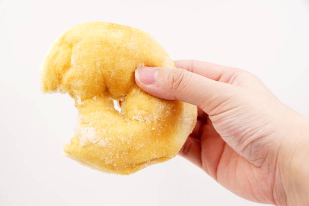 istock Yummy sugary coated donut snack 1209640377