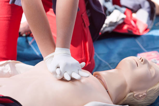 istock CPR - Cardiopulmonary resuscitation and first aid class 1209640694