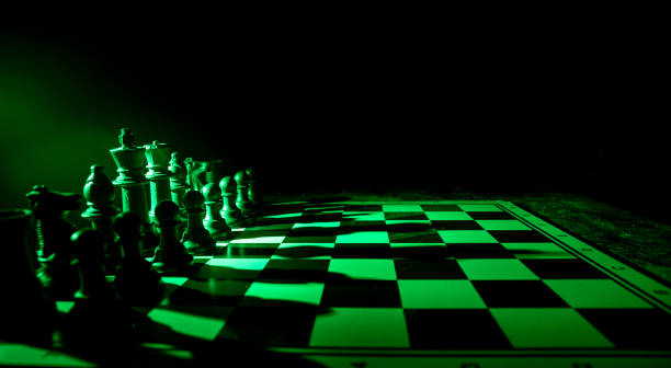 istock Chess figures on a dark background with smoke and fog. Selective focus 1209641629
