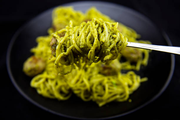 meatballs with pasta and pesto sauce