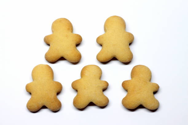 istock Gingerbread man cookies on a white background 1209648017