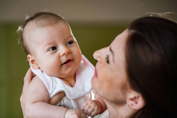 istock Happy baby girl 1209649467
