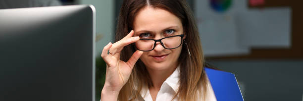 istock Pretty woman in office 1209650590
